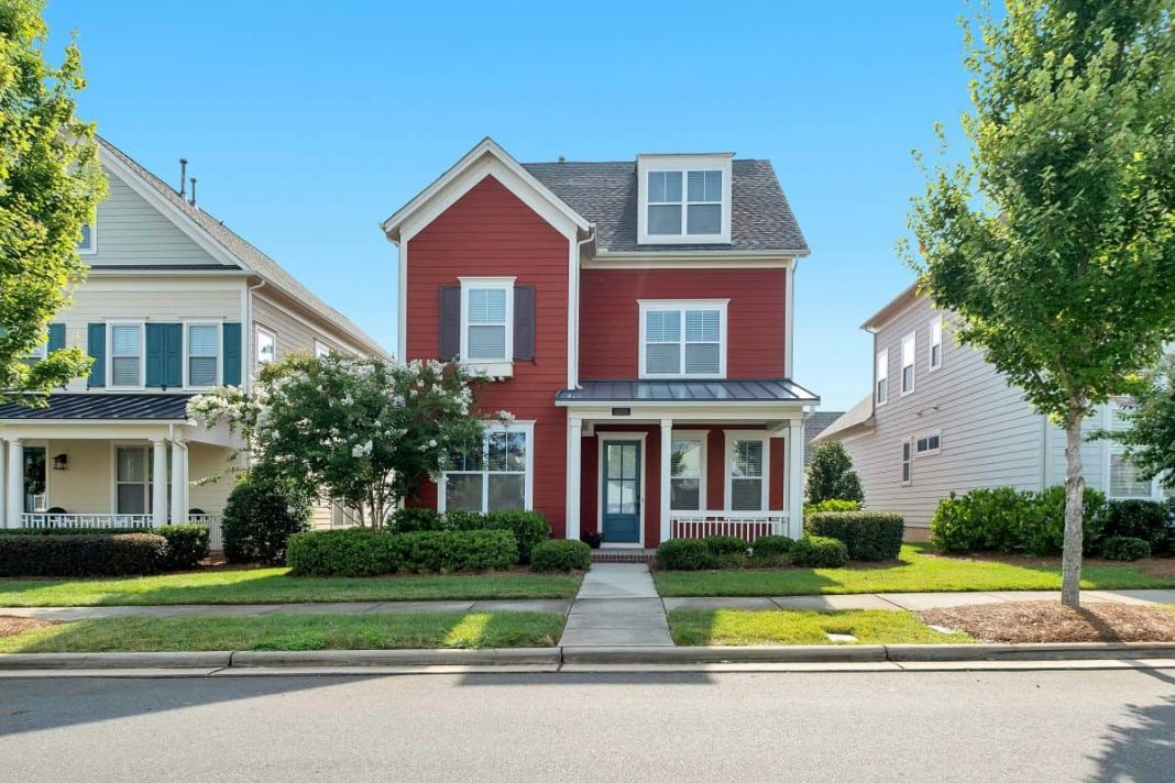 Two-story home being sold using a flat-rate real estate agent